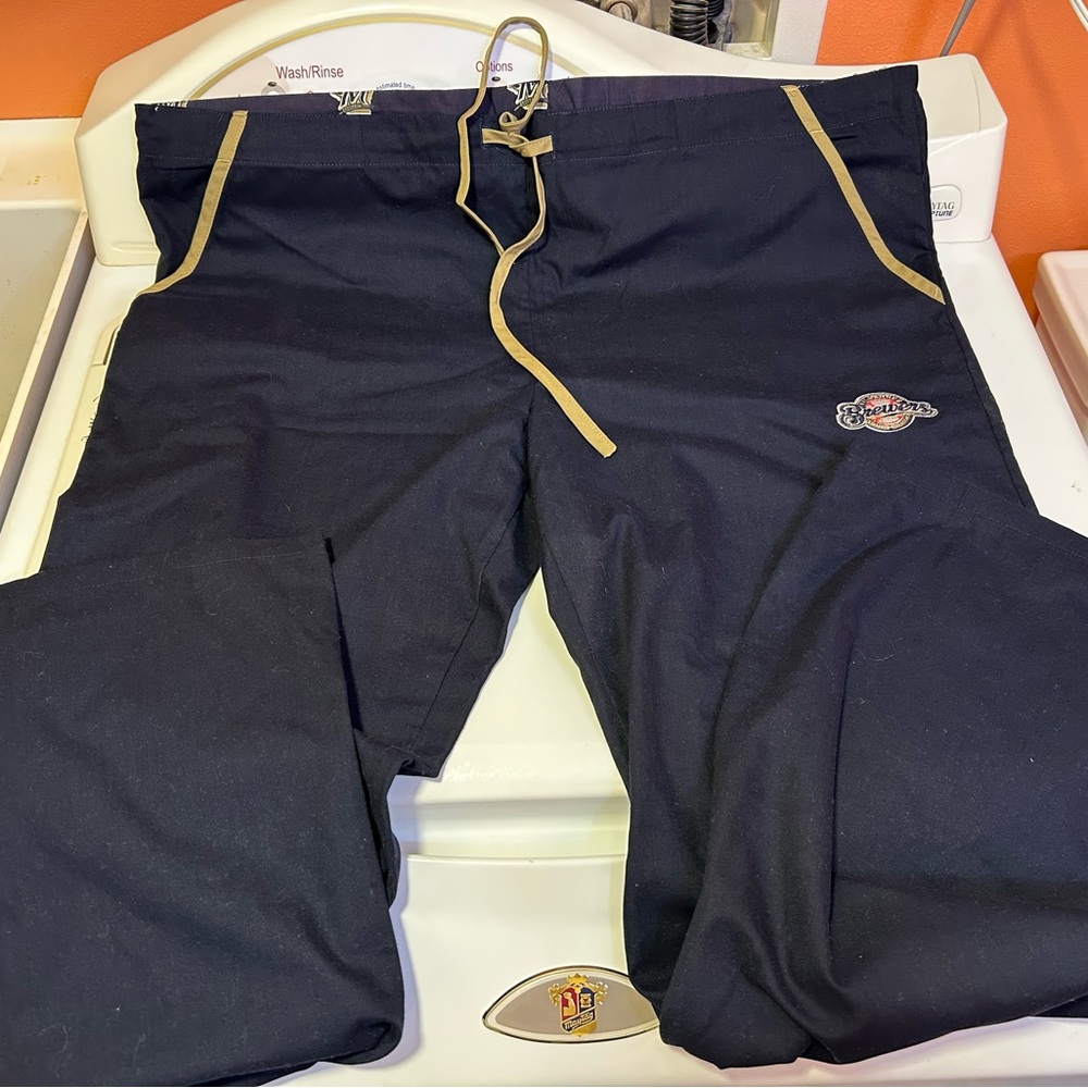 Milwaukee Brewers scrub pants.